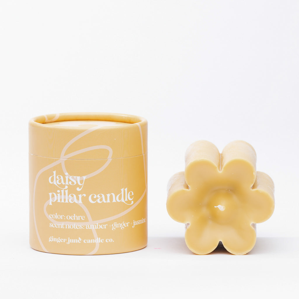 ochre daisy pillar candle  • soy candle